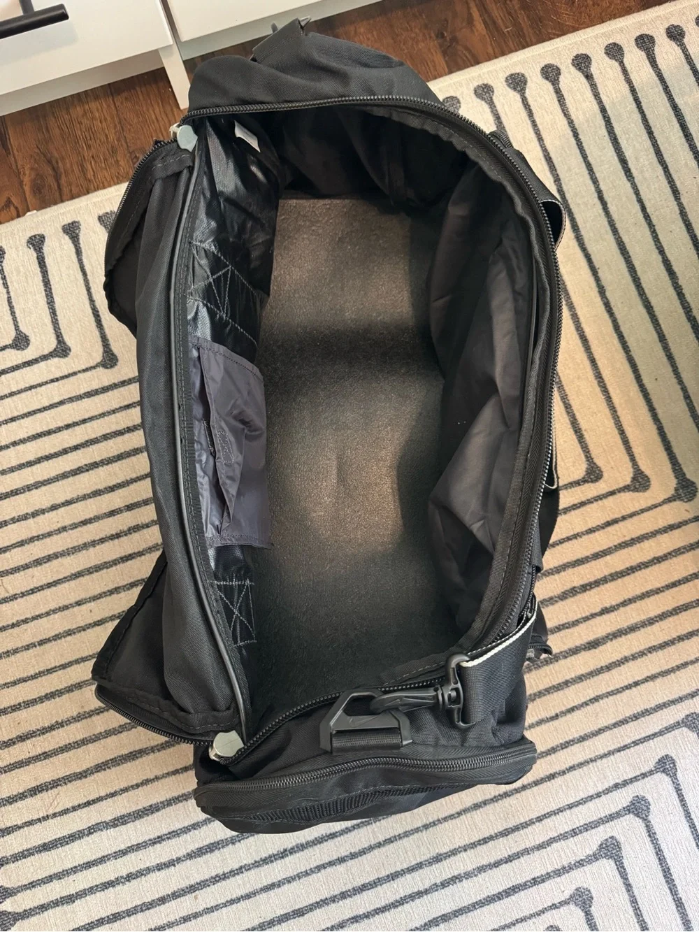 Nike Black Duffel Bag with White Swoosh Accent